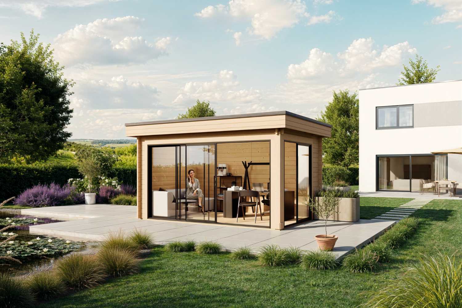 Das Gartenhaus Designlounge 44 D als Home Office eingerichtet mit telefonierenden Frau